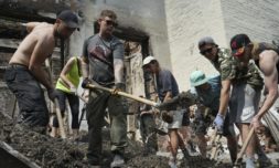 Young volunteers are rebuilding Ukrainian towns with clean-up raves