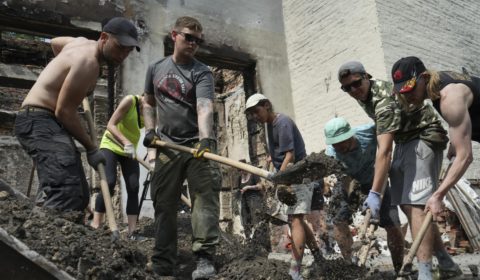 Young volunteers are rebuilding Ukrainian towns with clean-up raves
