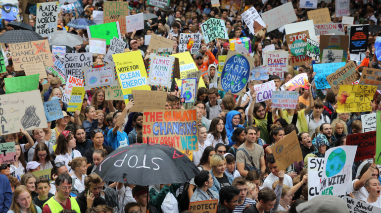 Why are protests taking place around the world this weekend?