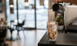 Is it acceptable to bring an iced coffee into a job interview?